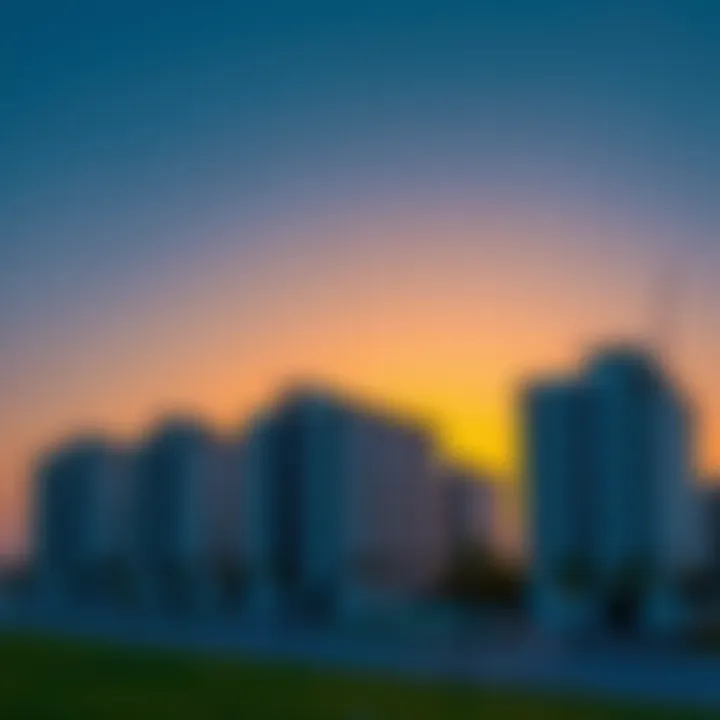 Modern residential buildings set against a sunset