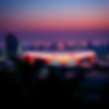 Night view of Cocola Arena highlighting its significance in Dubai's skyline