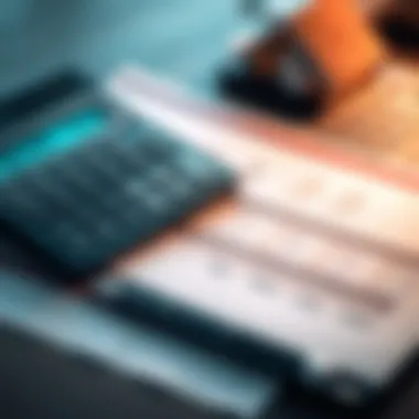 Calculator and financial documents symbolizing cost analysis