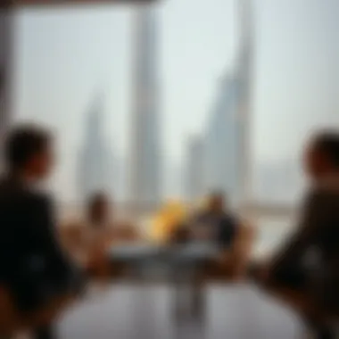 Investors discussing potential opportunities related to Burj Al-Sundus