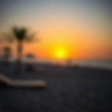 Tranquil beach scene with sunset over the Arabian Gulf